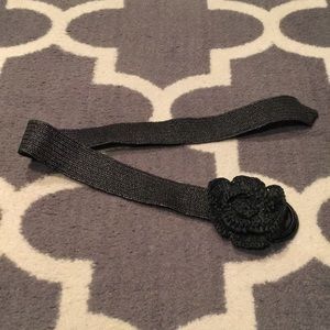 Black stretchy belt with flower detail